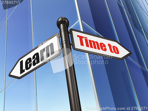 Image of Time concept: Time to Learn on Building background