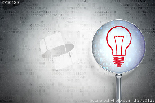 Image of Business concept:  Light Bulb with optical glass on digital back