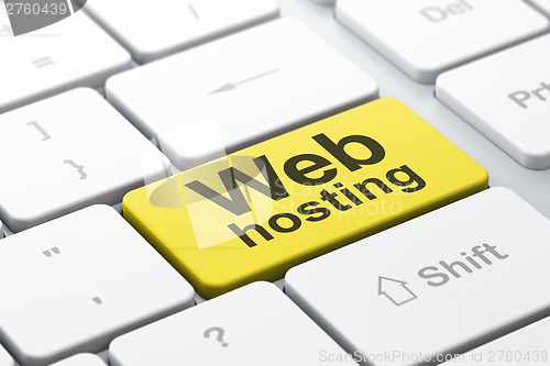 Image of SEO web development concept: Web Hosting on computer keyboard ba