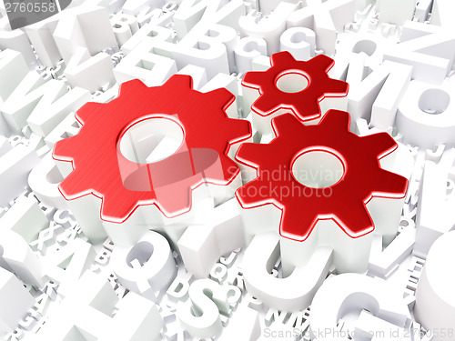 Image of Web development concept: Gears on alphabet background