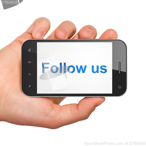 Image of Social media concept: Follow us on smartphone