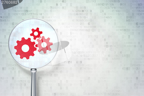 Image of Web design concept:  Gears with optical glass on digital backgro