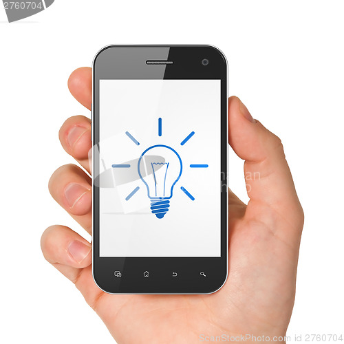 Image of Finance concept: Light Bulb on smartphone