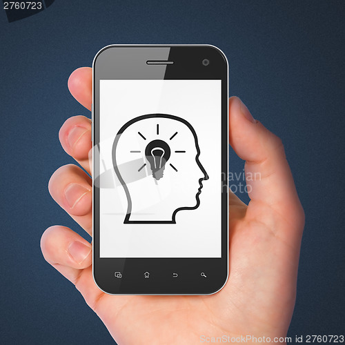 Image of Information concept: Head Whis Lightbulb on smartphone