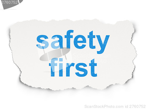 Image of Safety concept: Safety First on Paper background