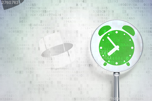 Image of Time concept:  Alarm Clock with optical glass on digital backgro
