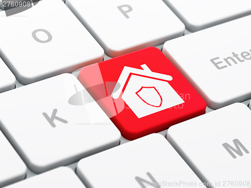 Image of Finance concept: Home on computer keyboard background