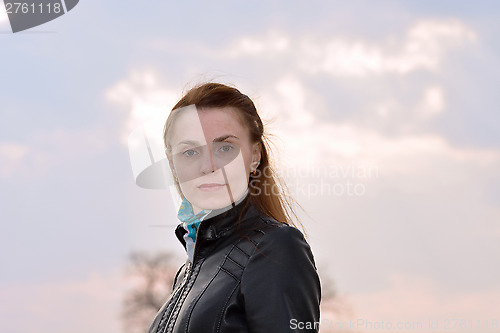 Image of Woman against the evening sky