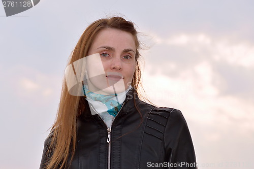 Image of Woman against the evening sky