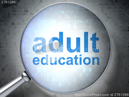 Image of Education concept: optical glass with words Adult Education