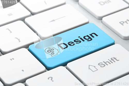 Image of Marketing concept: Head With Gears and Design on computer keyboa