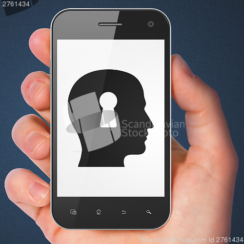 Image of Business concept: Head Whis Keyhole on smartphone