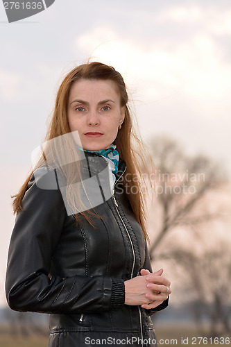 Image of Woman against the evening sky