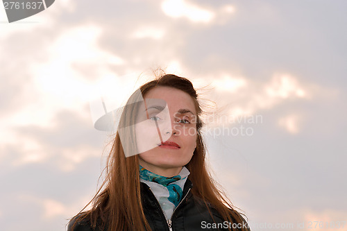 Image of Woman against the evening sky