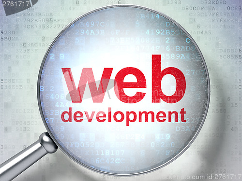 Image of Web development SEO concept: optical glass with words Web Develo