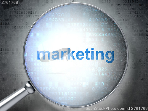 Image of Marketing concept: optical glass with words Marketing