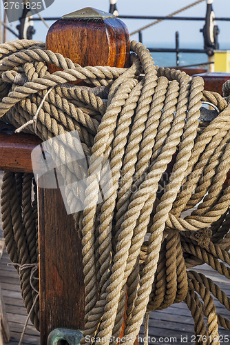 Image of coiled ropes on a sail ship