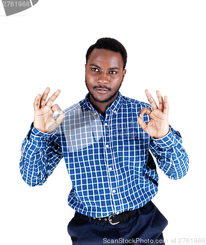 Image of Black man showing victory.