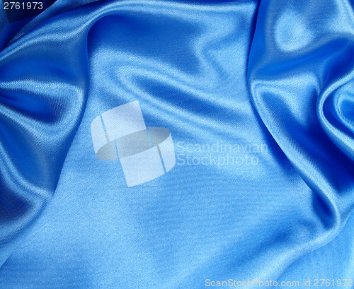 Image of Smooth elegant blue silk can use as background 