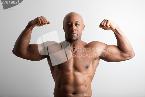 Image of Bodybuilder with Arms Crossed