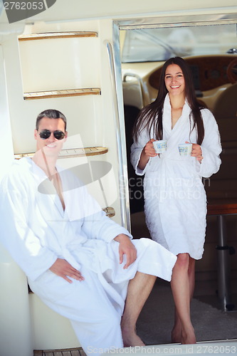 Image of young couple on yacht