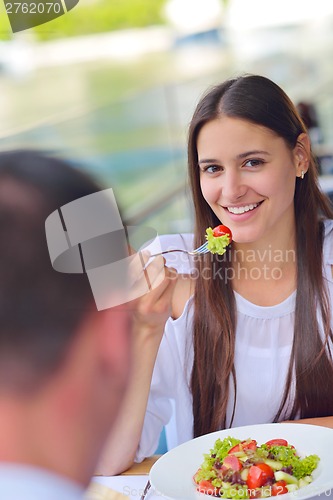 Image of couple having lanch at beautiful restaurant