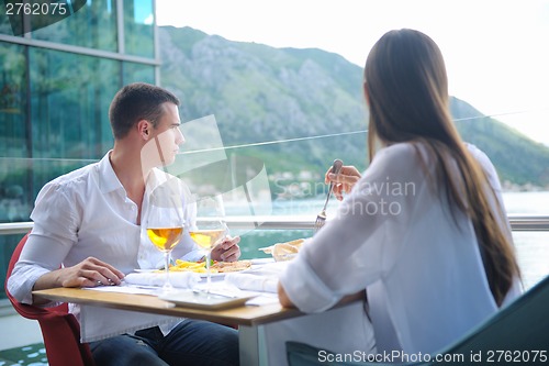 Image of couple having lanch at beautiful restaurant