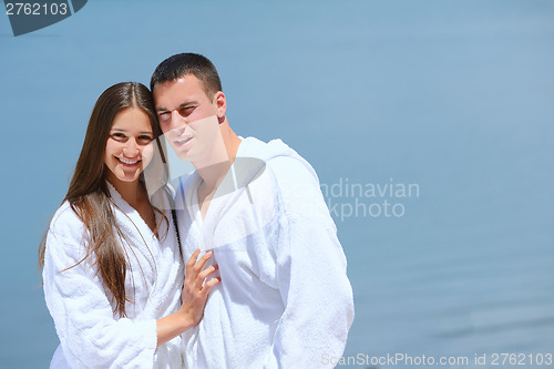 Image of young couple on yacht