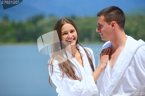 Image of young couple on yacht