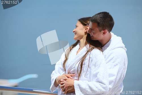 Image of young couple on yacht