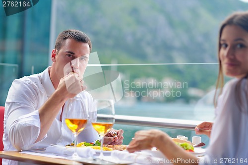 Image of couple having lanch at beautiful restaurant