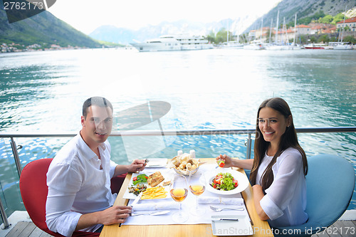 Image of couple having lanch at beautiful restaurant