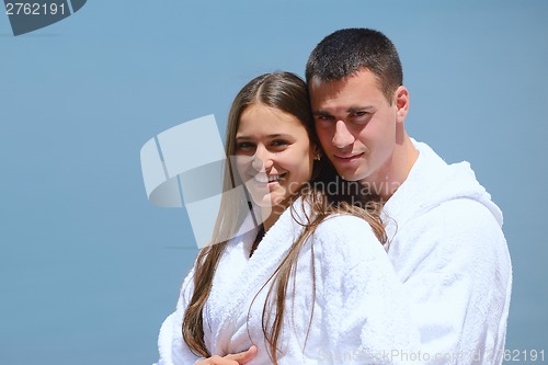 Image of young couple on yacht