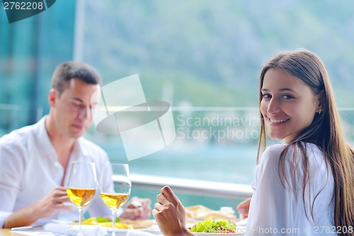 Image of couple having lanch at beautiful restaurant