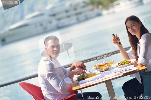 Image of couple having lanch at beautiful restaurant