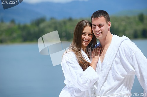 Image of young couple on yacht