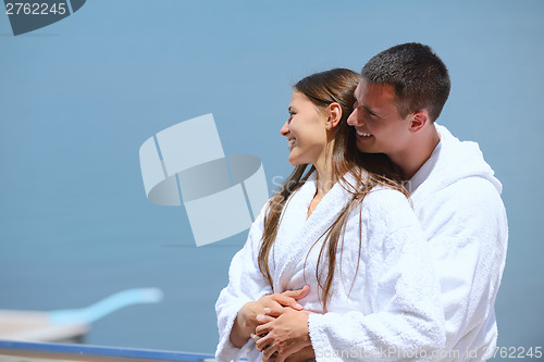 Image of young couple on yacht