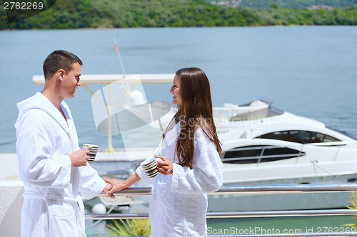 Image of young couple on yacht