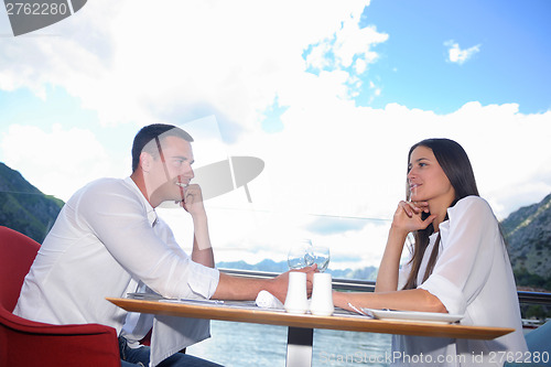 Image of couple having lanch at beautiful restaurant