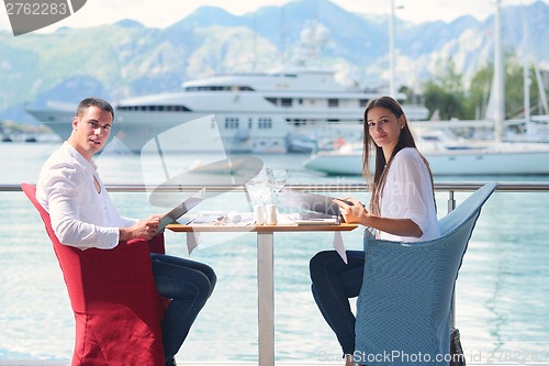 Image of couple having lanch at beautiful restaurant