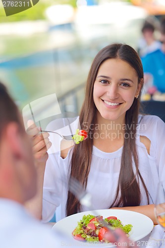 Image of couple having lanch at beautiful restaurant