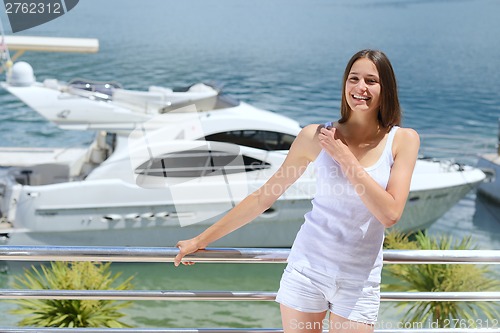 Image of woman on luxury yacht