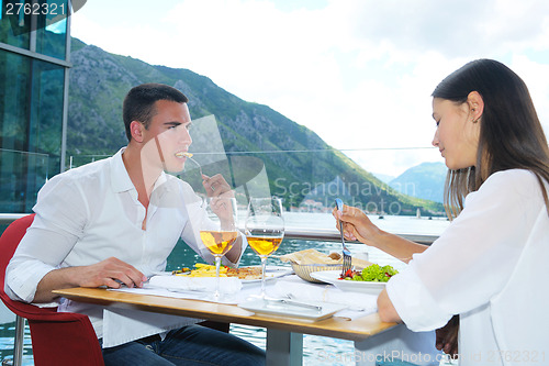 Image of couple having lanch at beautiful restaurant