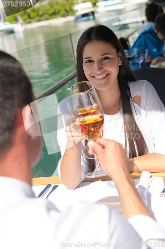 Image of couple having lanch at beautiful restaurant