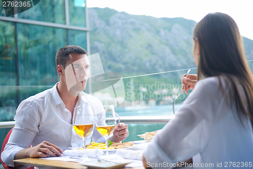 Image of couple having lanch at beautiful restaurant