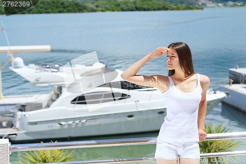 Image of woman on luxury yacht