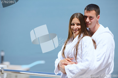 Image of young couple on yacht