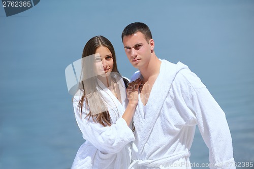 Image of young couple on yacht