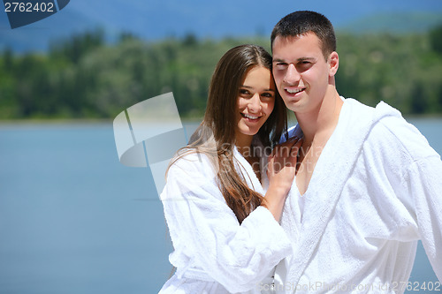 Image of young couple on yacht