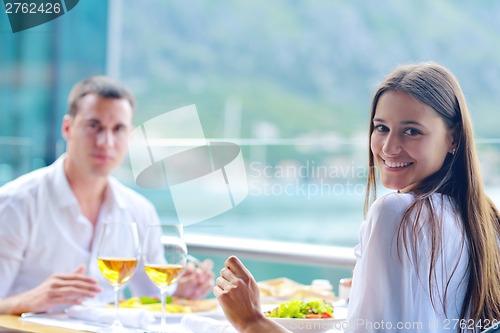 Image of couple having lanch at beautiful restaurant